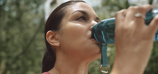 women drinking in nature
